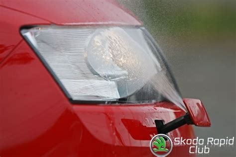 Как заправить омыватель фар в Tiguan 1